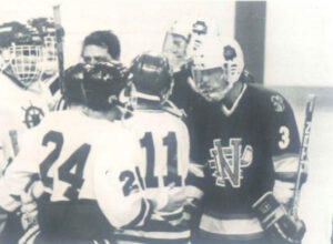 Players from Mercyhurst and Notre Dame meet on the ice during the first meeting between the teams November 25, 1987.